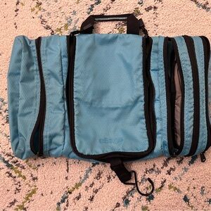 eBags Pack it Flat Toiletry Kit aqua blue